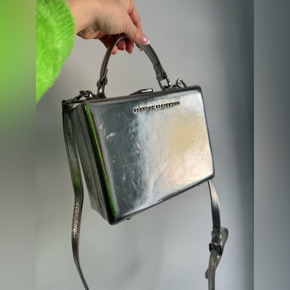 Brandon Blackwood silver metallic trunk